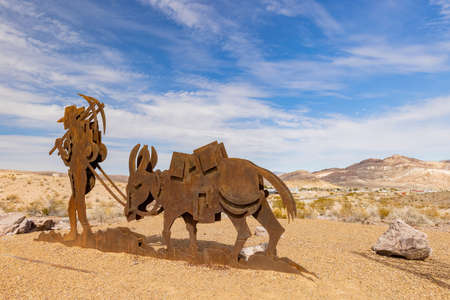 Metal sculpture sign before entering Beatty town at Nevadaの写真素材