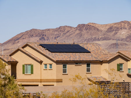 Sunny view of a two stories house with solar panel at Nevada