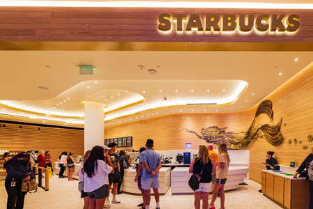 Las Vegas, JUN 28, 2021 - People queueing in the Starbucks Coffee of the Resorts World casinoのeditorial素材