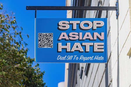 Sunny view of a Stop Asian Hate sign in San Francisco, Californiaの写真素材