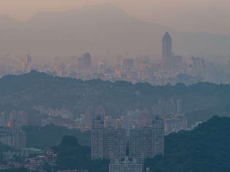Sunset high angle view of the cityscape form Wenshan District at Taipei, Taiwanの写真素材