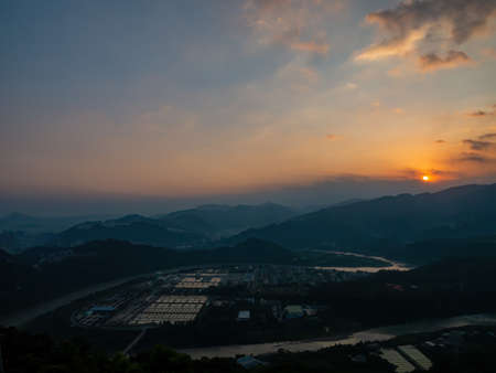Sunrise high angle view of the Zhitan Purification Plant at New Taipei City, Taiwanの写真素材