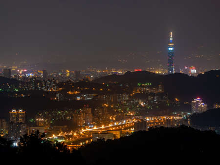 Sunset high angle view of the cityscape form Wenshan District at Taipei, Taiwanの写真素材