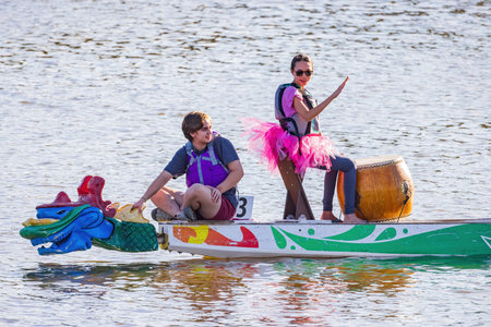 Oklahoma, OCT 2, 2021 - People rowing the dragonboat during the Regatta Festival event