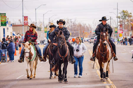 Oklahoma, DEC 4, 2021 - Police riding horses in the Cowboy Christmas Paradeのeditorial素材