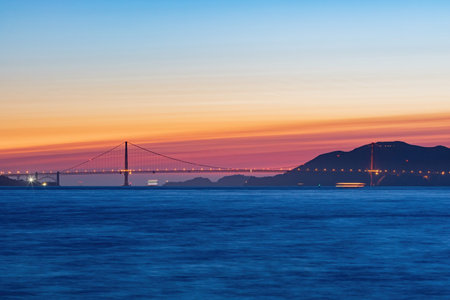 Sunset view of the famous Golden Gate Bridge at San Francisco, Californiaの写真素材