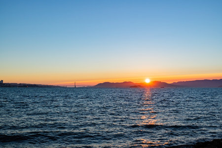 Sunset view of the famous Golden Gate Bridge at San Francisco, California