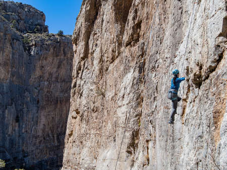 People doing rock climbing sports at Nevadaの写真素材