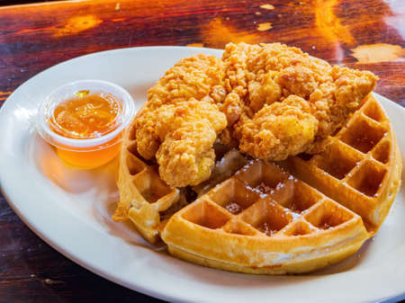 Close up shot of deep fried chicken with waffle at New Orleans, Louisianaの写真素材