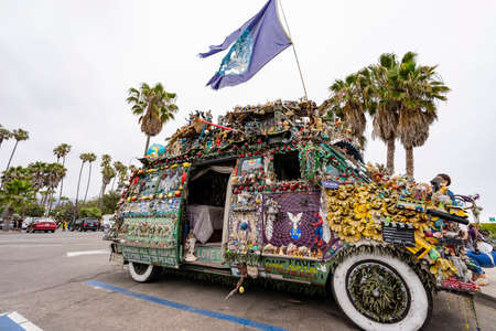 Santa Barbara, JUL 2 2016 - Overcast view of a car heavy decorate with many figuresのeditorial素材