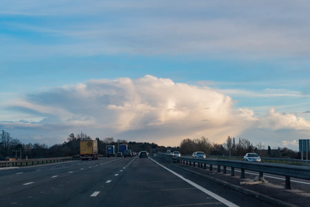 United Kingdom, MAR 29 2015 - Country side of road and vehicle driving