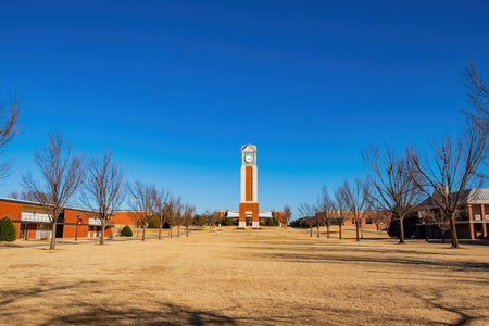 Sunny view of the Freede Centinnial Tower in Oklahoma Christian University at Edmond, Oklahomaのeditorial素材