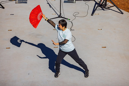 Oklahoma, JAN 29 2022 - Sunny view of the Tai chi art performance in Lunar New Year Festivalのeditorial素材