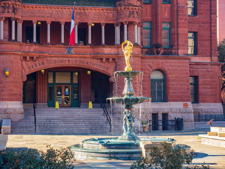 Sunny view of Courthouse building and Lady of Justice statue at Texas