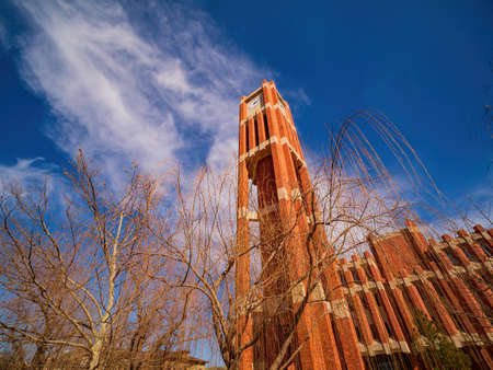 Sunny view of The clock tower of OU at Oklahomaの写真素材