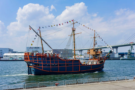 Osaka, APR 29 2011 - Antique ship and Tempozan Ohashi Bridge