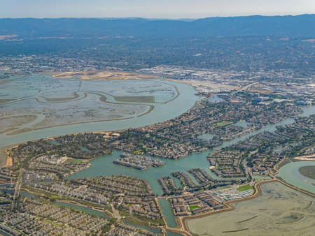 Aerial view of the Bair Island State Marine Park and cityscape at Californiaの写真素材