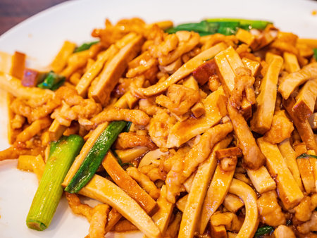 Close up shot of pork slice fried with tofu at Oklahoma