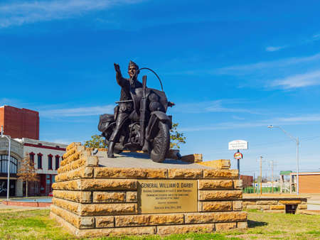 Arkansas, MAR 20 2022 - Sunny view of the Cisterna Park with World War II hero statueのeditorial素材