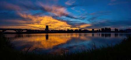 Sunset river landscape along the Dadaocheng area at Taipei, Taiwanの写真素材