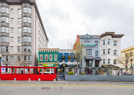 Washington DC, MAR 31 2022 - Overcast view of curbside restaurantのeditorial素材