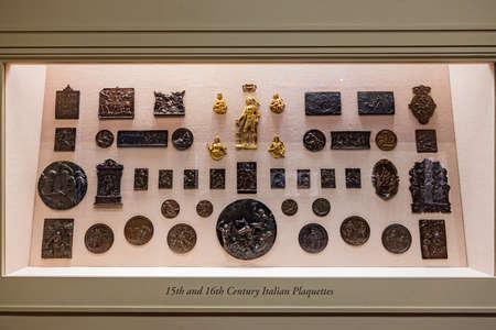 Washington DC, MAR 31 2022 - Close up shot of the 15th and 16th Italian Plaquettes display in the National Gallery of Artのeditorial素材