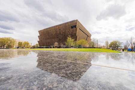 Washington DC, APR 1 2022 - Interior view of the National Museum of African American History and Culture with cherry tree blossomのeditorial素材