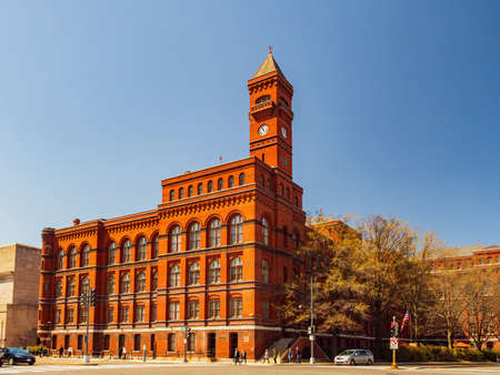 Washington DC, APR 2 2022 - Sunny view of the clock tower of Sidney R. Yates Federal Buildingのeditorial素材