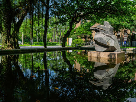 Taipei, JUL 1 2014 - Sunny view of the Ju Ming art sculpture of NTU campusのeditorial素材