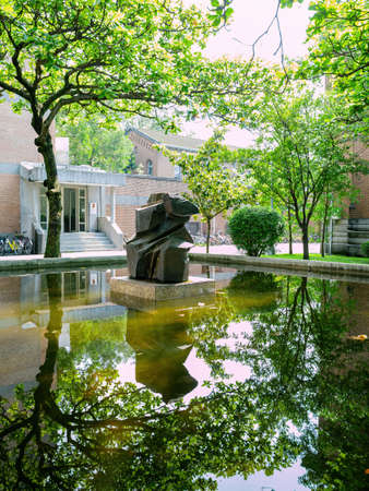 Taipei, JUL 1 2014 - Sunny view of the Ju Ming art sculpture of NTU campusのeditorial素材