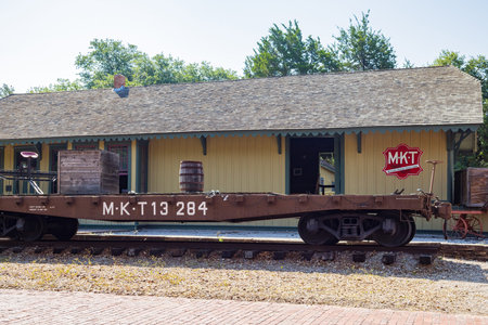 Texas, JUN 19 2022 - Sunny view of historical Missouri Kansas Texas Line building in Old City Park