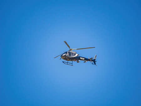 Oklahoma, JUN 25 2022 - Sunny view of the police Helicopter supporting Oklahoma City Pride Pridefest paradeのeditorial素材