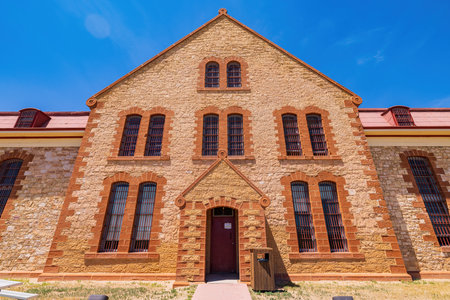 Wyoming, JUL 9 2022 - Sunny exterior view of the Wyoming Territorial Prisonのeditorial素材