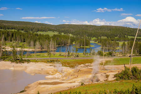 Sunny view of the landscape around Mud Volcano in Yellowstone National Park at Wyomingの写真素材