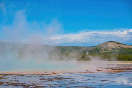 Sunny view of beautiful landscape along Grand Prismatic Spring from ground level at Wyomingの写真素材