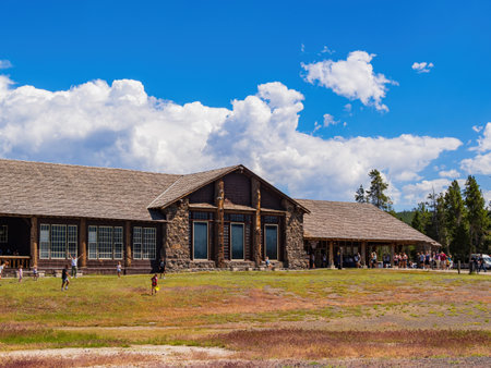 Wyoming, JUL 6 2022 - Sunny view of the Old Faithful Lodgeのeditorial素材