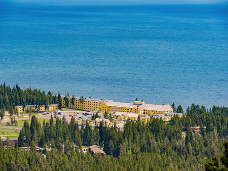 Sunny beautiful high angle view of the Yellowstone Lake landscape and Lake Yellowstone Hotel in Yellowstone National Park at Wyomingのeditorial素材