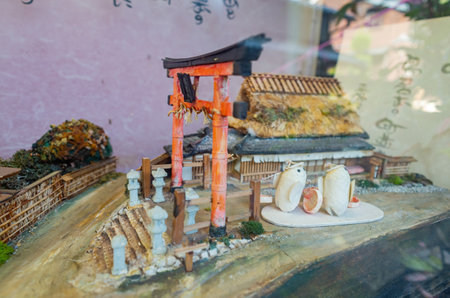 Kyoto, NOV 16 2013 - Close up shot of cute pupa art sovenirs selling in a gift shopのeditorial素材