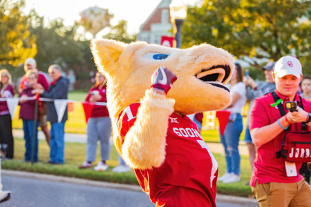 Oklahoma, OCT 15 2022 - Sunny view of the student Marching Band walking in Homecoming paradeのeditorial素材