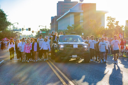 Oklahoma, OCT 15 2022 - Student walking in Homecoming paradeのeditorial素材