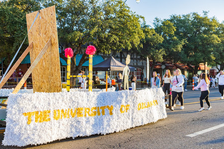 Oklahoma, OCT 15 2022 - Student walking in Homecoming parade