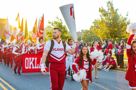 Oklahoma, OCT 15 2022 - Sunny view of the student Marching Band walking in Homecoming paradeのeditorial素材