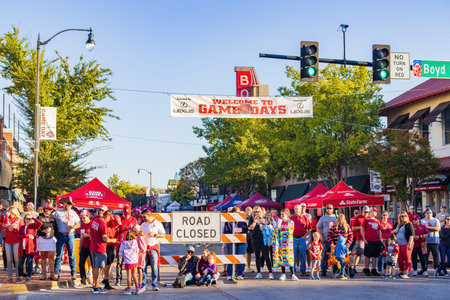 Oklahoma, OCT 15 2022 - Student walking in Homecoming paradeのeditorial素材