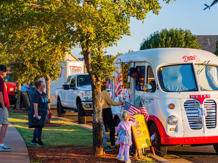 Oklahoma, OCT 11 2022 - Afternoon view of a free food truck event in a communityのeditorial素材