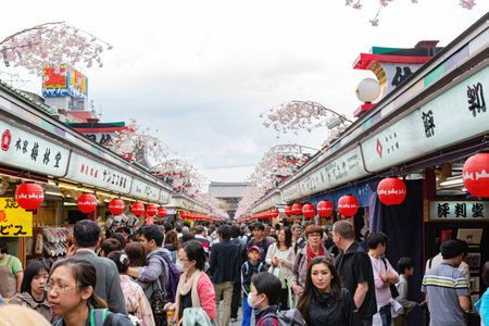 Tokyo, APR 6 2013 - Many visitor traveling in the Nakamise Shopping Streetのeditorial素材
