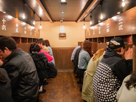 Tokyo, APR 3 2013 - Close up shot of many people eating in Ichiran Ramenのeditorial素材