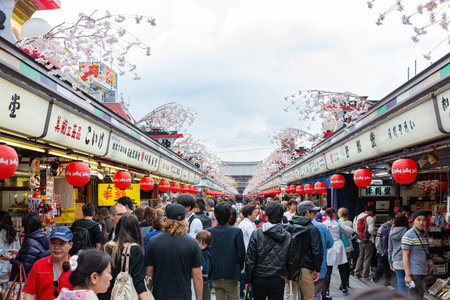 Tokyo, APR 6 2013 - Many visitor traveling in the Nakamise Shopping Streetのeditorial素材