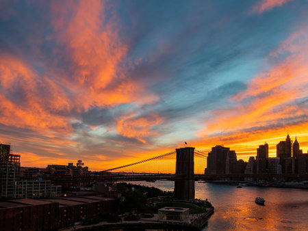 Sunset afterglow of the Brooklyn Bridge and New York City skyline at New York