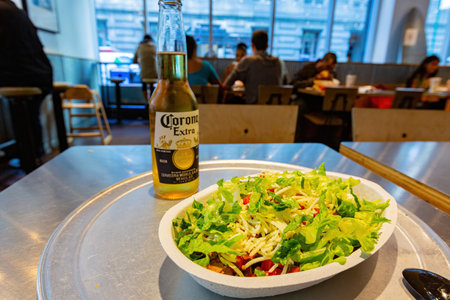 New York, SEP 17 2014 - Close up shot of a salad and Corona beerのeditorial素材