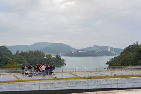 Taiwan, JAN 27 2013 - Group of people taking picture with the sunmoon lakeのeditorial素材